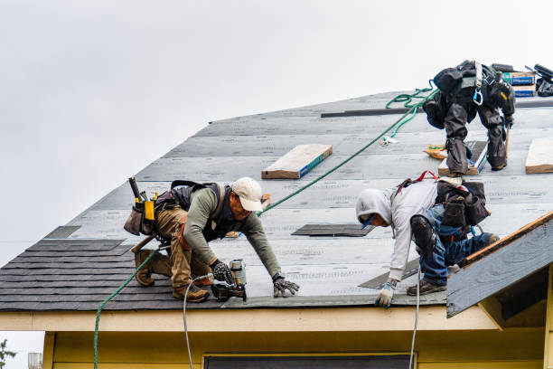 Professional Roofing technician working in Beach City, OH